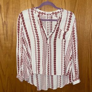 Oversized Blu Pepper high-low blouse in the size small.